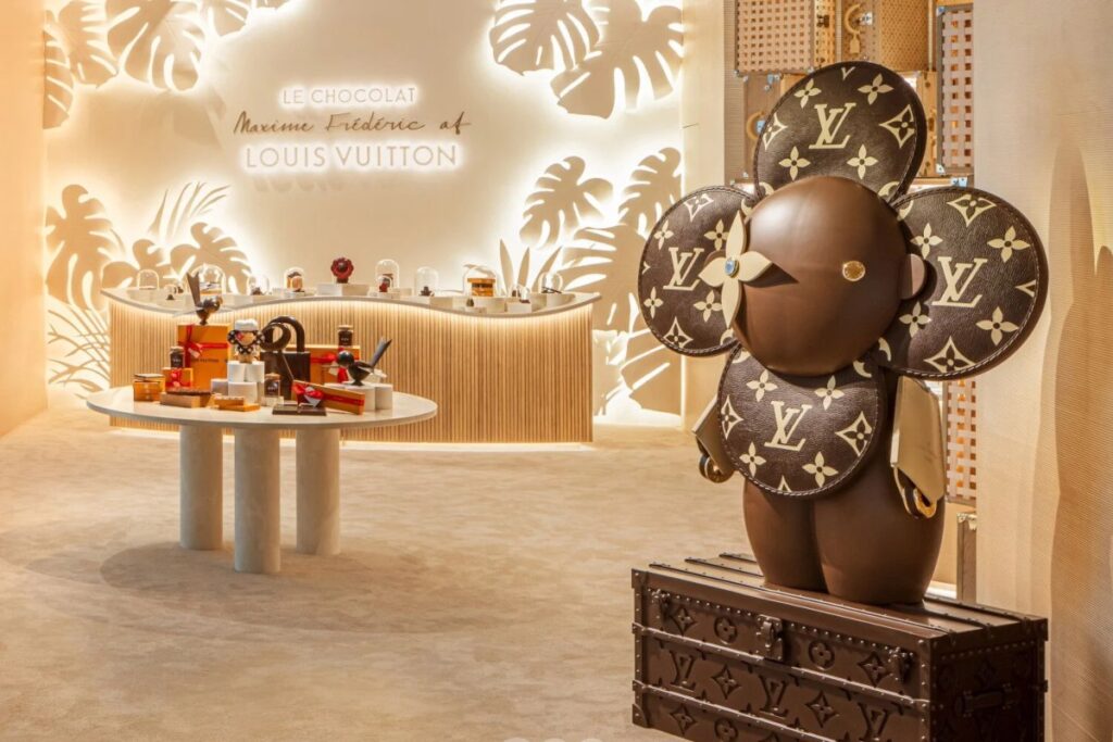 Vivienne and Petula await: A world of luxury chocolate at Louis Vuitton's new store / Photo via Louis Vuitton