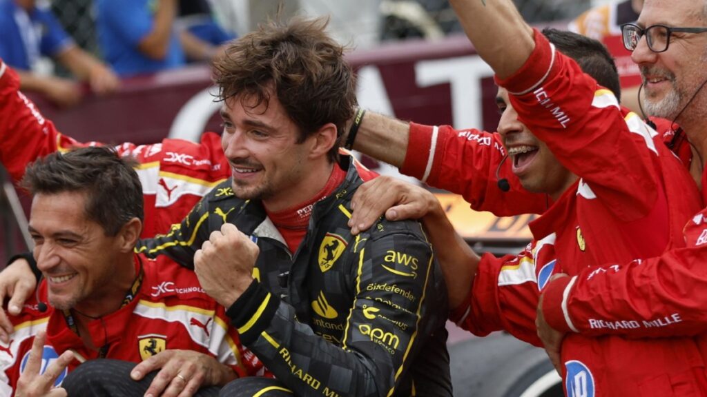 Leclerc raises the Italian Grand Prix trophy for Ferrari / Photo via Ferrari