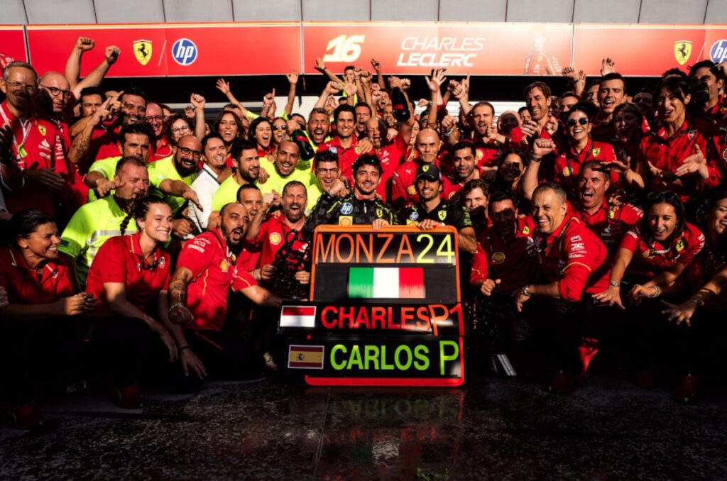 Leclerc raises the Italian Grand Prix trophy for Ferrari / Photo via Ferrari