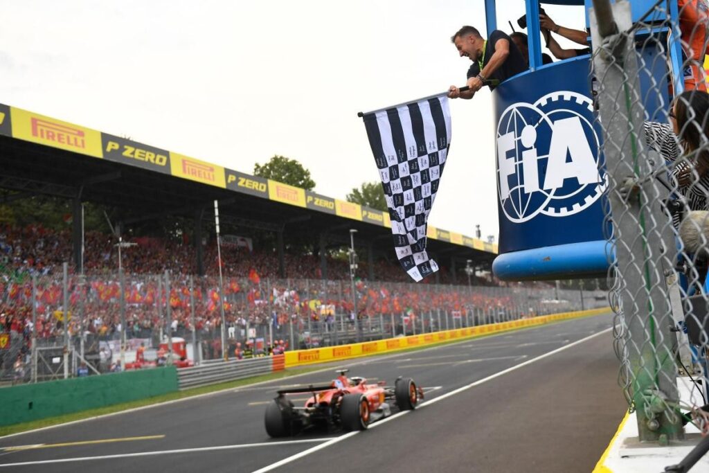 Leclerc raises the Italian Grand Prix trophy for Ferrari / Photo via Ferrari