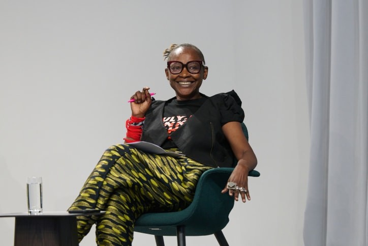 Koyo Kouoh, Zeitz MOCAA execu­tive director and chief curator, during the talk ‘When We See Us, A Century of Black Figuration in Painting’ in the Conversations program of Art Basel in Basel 2024./ Photo via Art Basel