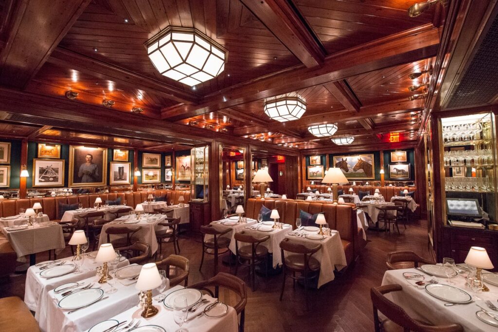 . The restaurant's decor includes equestrian art, a mural based on Koehler's painting / Photo via eaterny