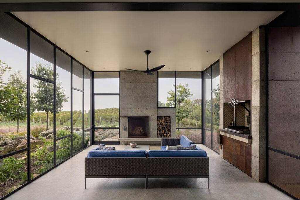 Corten steel siding gives the home an organic feel, camouflaging it with the landscape / Photo via Olson Kundig