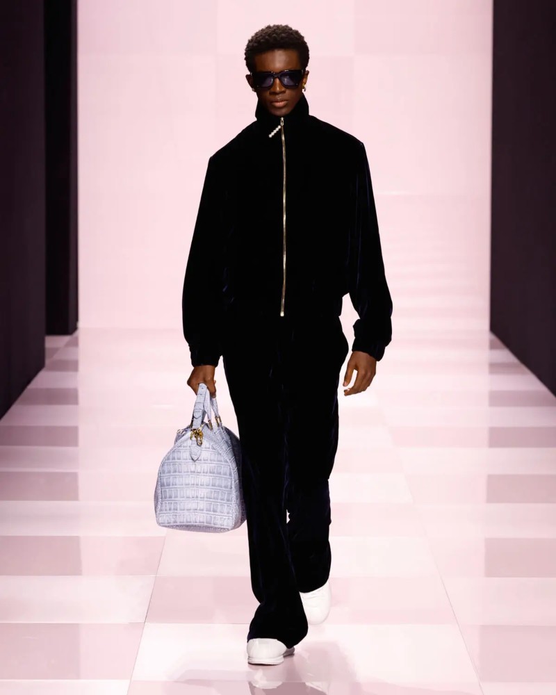 The collection merged urban aesthetics with classic elegance, offering a glimpse into the future through the lens of history / Photo via Louis Vuitton x Nigo