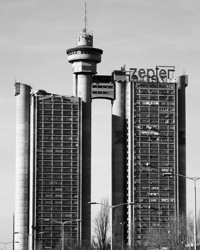 Designed to symbolize a gateway welcoming visitors from the airport, the tower's distinctive structure is a testament to the adaptability of Brutalist design / Photo via Architecture Today