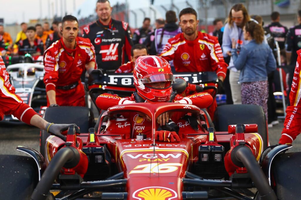 Charles Leclerc and Ferrari Pit lane crew / Photo via F1