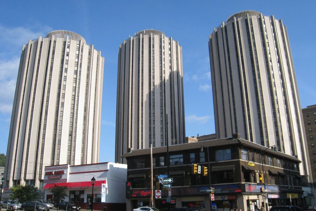 At the University of Pittsburgh, the Litchfield Towers serve as a striking example of Brutalist architecture in an academic setting / Photo via WhiteMAD