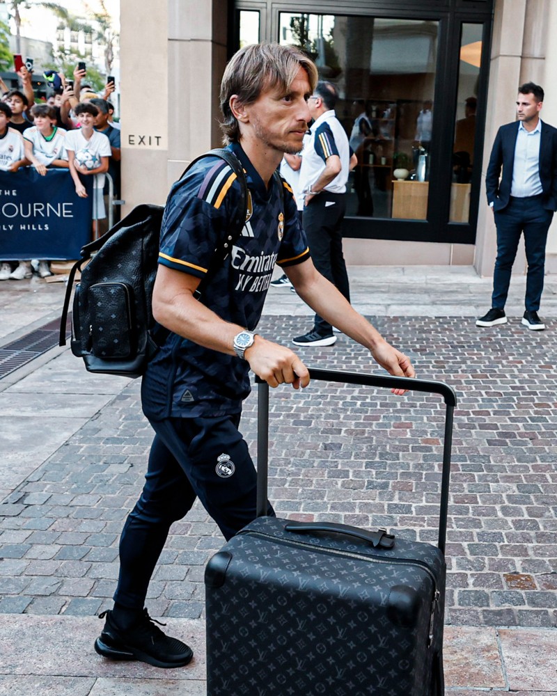 Luka Modric and Louis Vuitton Rolling Trunk / Photo via Louis Vuitton