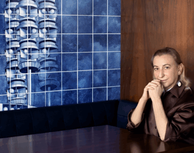 Miuccia Prada and Versace