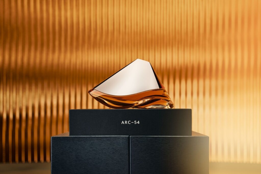 The decanter, sculpted from handblown glass, draws design inspiration from the dynamic aerodynamics of the Aston Martin Valkyrie / Photo via Bowmore