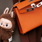 Few could have predicted that Labubu would become a regular accessory on the arms of Hermès devotees / Photo Launchmetrics Spotlight through Cosmopolitan.com