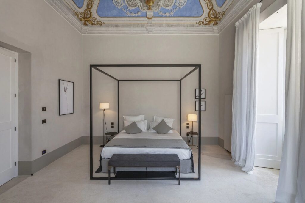 The hotel’s 16 uniquely styled rooms and suites each embody a quiet, botanical-inspired luxury / Photo via Palazzo Tafuri