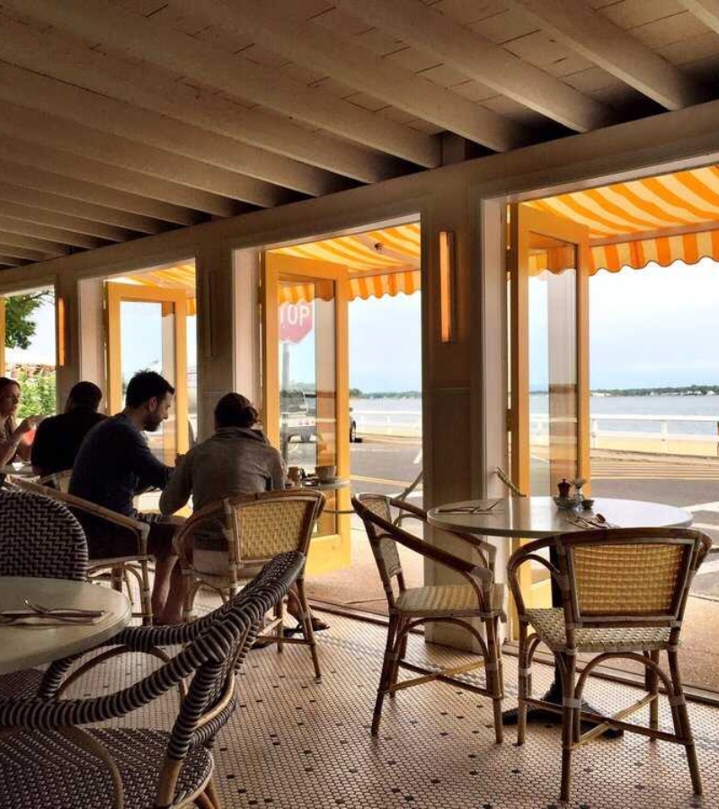 Nestled in a towering tree, this coastal oasis brings the flavors of Italy and the French Riviera to New York’s Hamptons. / Photo Sunset Beach