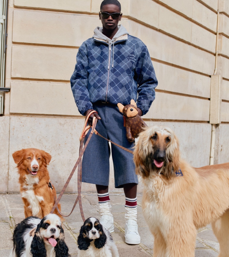 Muted tones and aged textures define garments and accessories with rugged sophistication. Camouflage meets luxury across bags, shoes, tents, chairs, and sleeping bags. / Photo LV