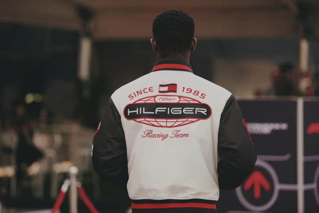 Tommy Hilfiger’s long-standing love affair with motorsport began not on a design board, but at the fences of Watkins Glen, where a young Hilfiger watched Formula 1 cars scream past / Photo via Tommy Hilfiger