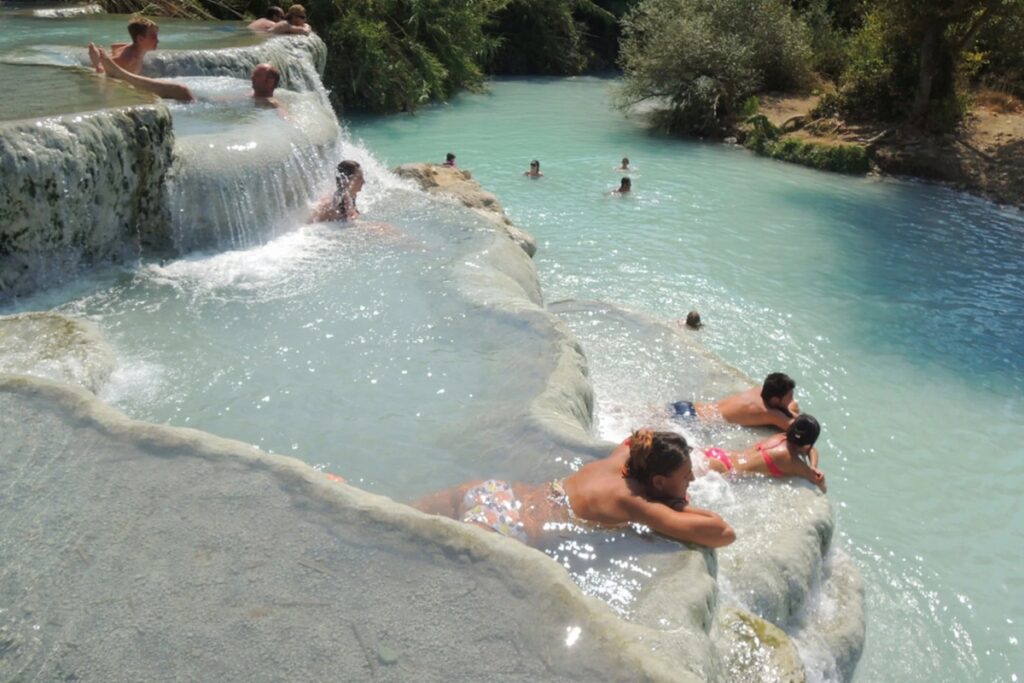 Across the world, geothermal springs, thermal spas, and wellness sanctuaries offer a revitalizing way to bond with Dad. / Photo Terme di Saturnia