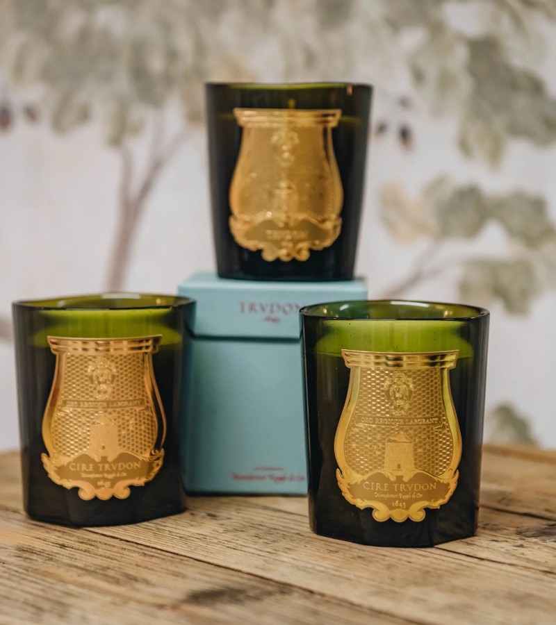 Trudon’s iconic “Cire” candle captures the fragrance of wax in production: a soothing mix of soft honey, bergamot, sandalwood, and bee-wax absolutes / Photo via Cire Trudon