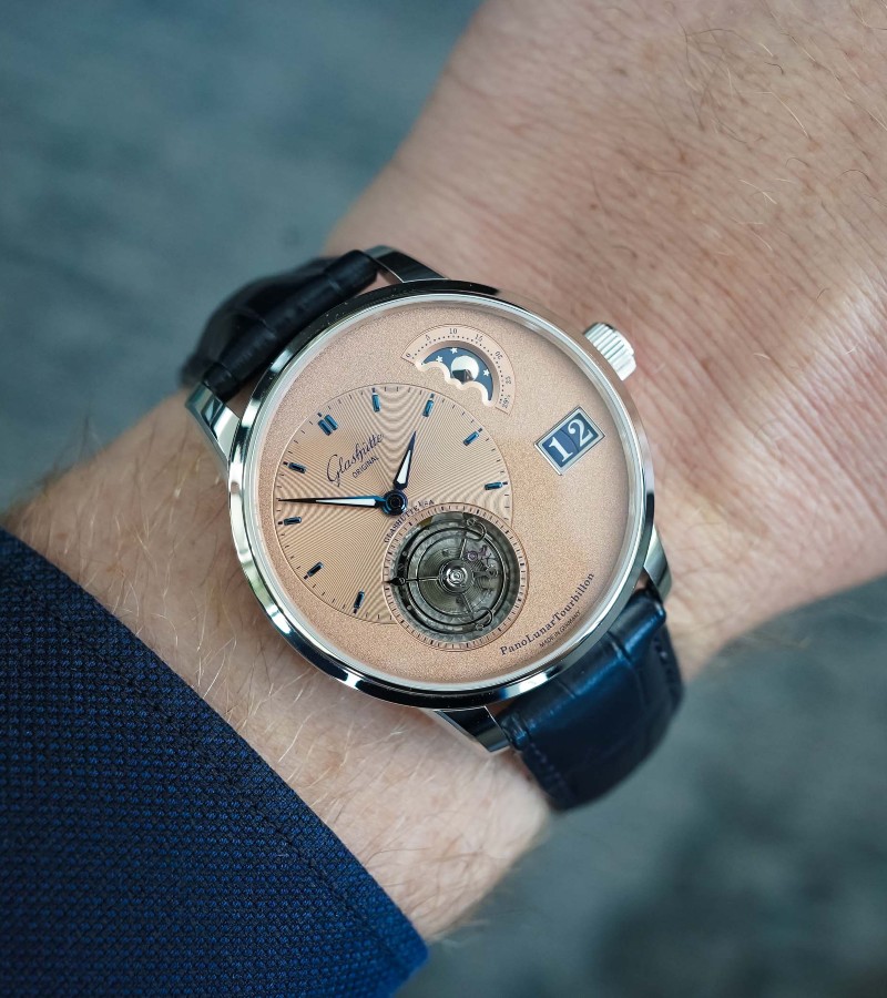 Crafted in a pristine 40 mm platinum case, the PanoLunarTourbillon of Glashütte Original features a rich “iron‑ore” salmon dial / Photo via Glashütte