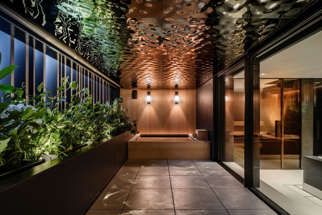 VIBROA’s services extend beyond real estate, offering concierge services, private banking, and family education support. / Photo Aston Martin