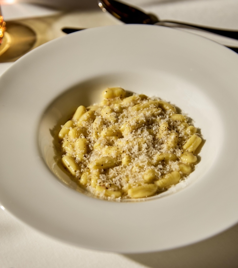 The gastronomic offerings at Aman Rosa Alpina are equally refined. The property is home to the celebrated three-Michelin-starred St. Hubertus restaurant. / Photo via AMAN