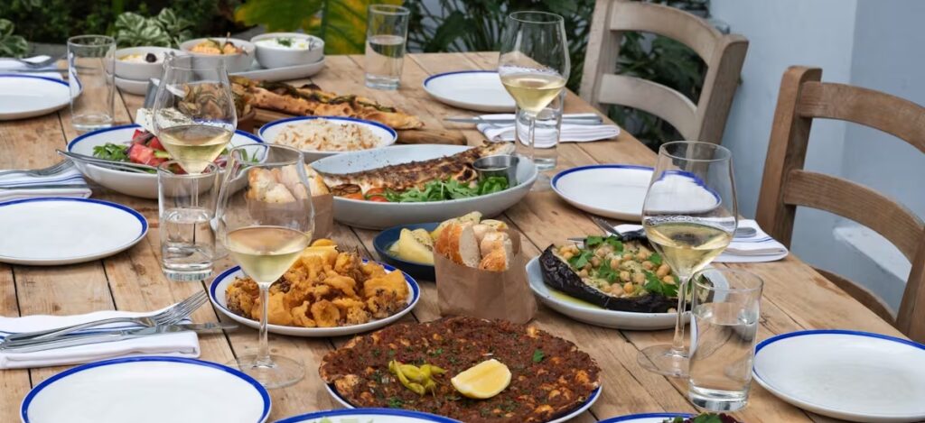 Some of Miami’s top restaurants take you far without flying miles / Photo via Mandolin Aegean Bistro