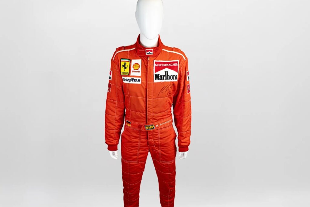 The crown jewel of this Schumacher auction is undoubtedly the 1996 Scuderia Ferrari OMP Signed Racing Suit. / Photo Sothebys