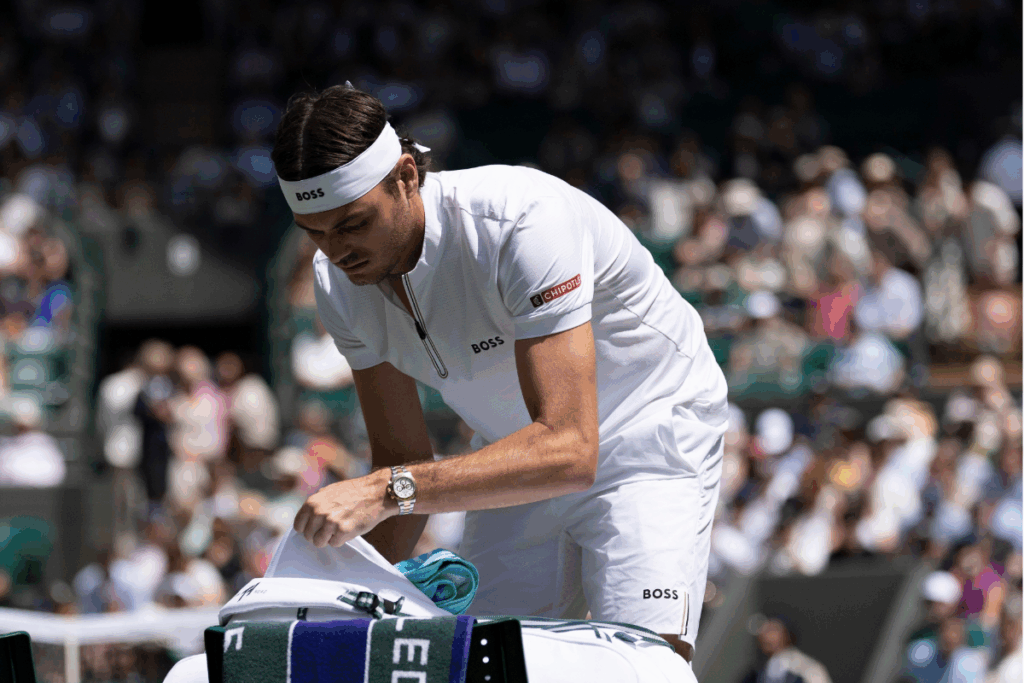 Taylor Fritz also wears a Rolex Daytona, with bicolor bracelet (steel and yellow gold) and white dial / Photo Courtesy Rolex