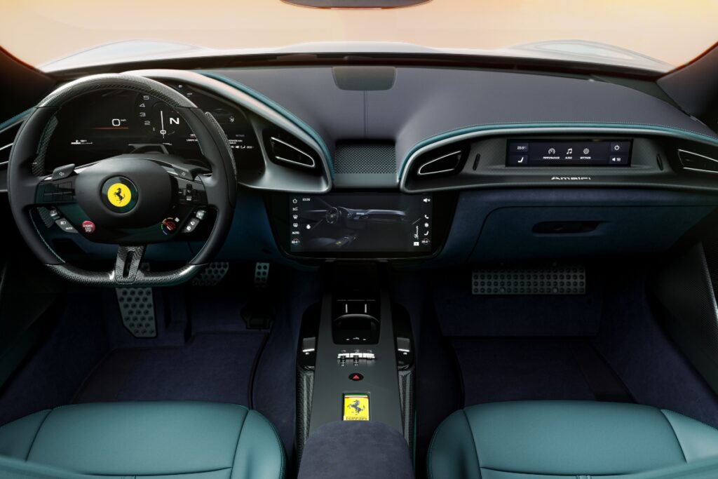 The dual-cockpit layout wraps driver and passenger in futuristic symmetry, with contrasting stitching, carbon fiber accents, and finely sculpted surfaces. / Photo Ferrari
