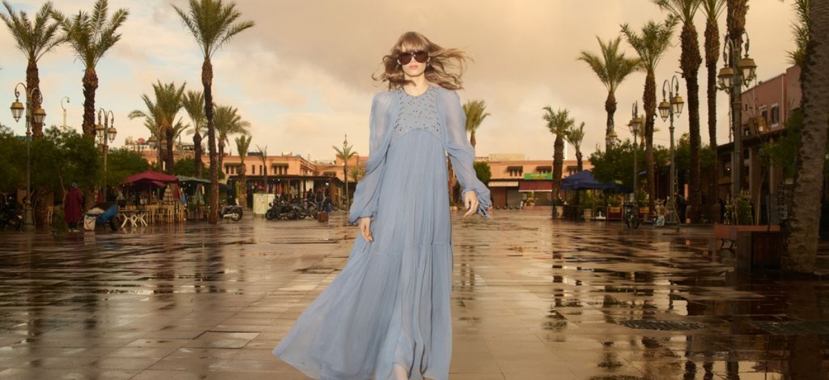 The palette moves through earthy terracotta, zesty sunset yellow, soft pistachio green, and rich oceanic blue. / Photo via H&M Studio