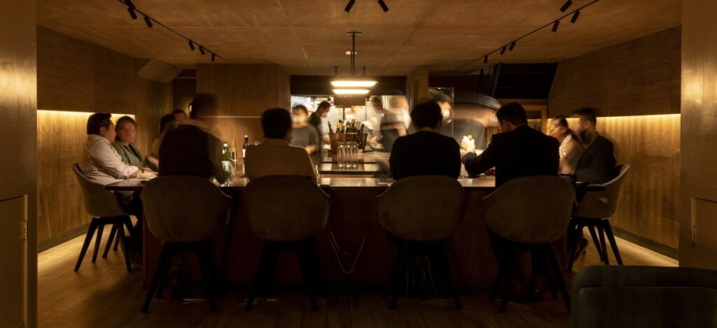 At Atomix, guests are invited to embark on an exquisite tasting menu that showcases the depth and richness of Korean cuisine, reimagined for contemporary palates. / Photo via Atomix