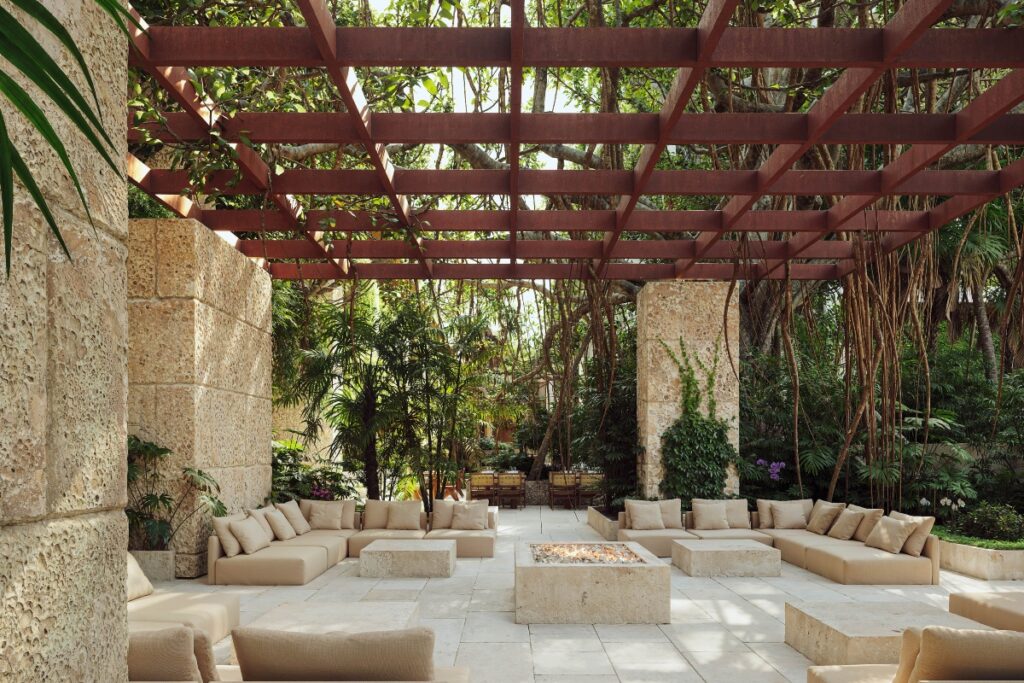 The development prioritizes walkability with tree-lined paseos and a lush central courtyard that serves as a communal heart / Photo Ziggurat