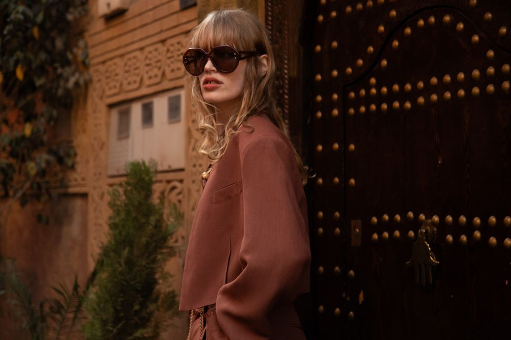 This collection is built for transition and adaptability, key to any modern traveler’s wardrobe. / Photo via H&M Studio