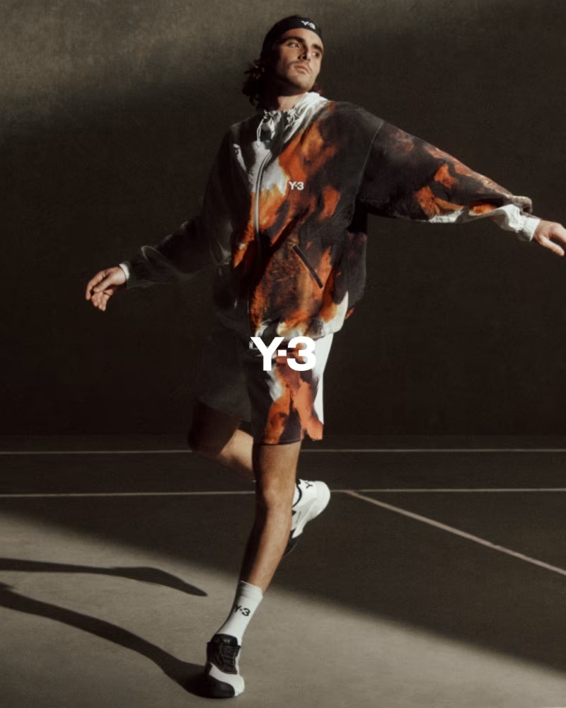 These designs sit against clean, structured silhouettes that echo precision and control, while asymmetric cuts add a sense of unpredictability / Photo via Y3