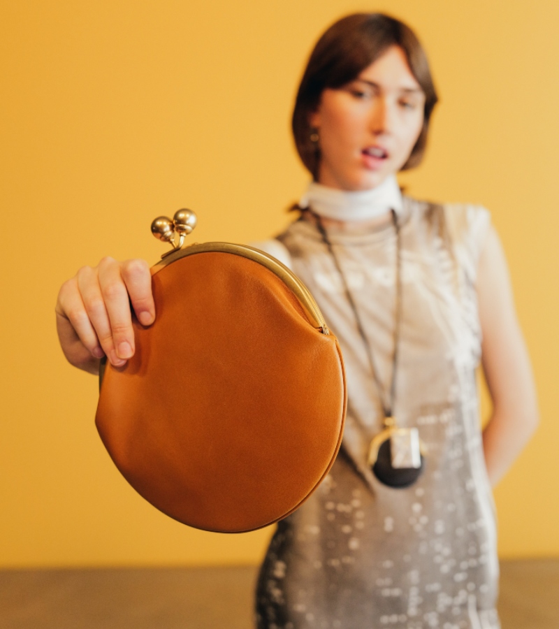 The brand used repurposed denim and leather across outerwear and accessories, reflecting its commitment to modern, responsible design. / Photo via Ben Rosser - BFA