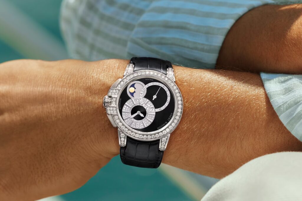 Other models include variations like the Ocean Moon Phase 36mm, Sparkling Big Date Automatic 42mm, and Zalium versions. / Photo via Harry Winston