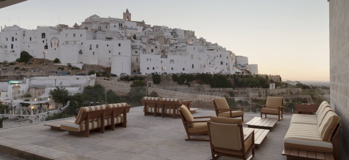 Vista Ostuni is a luxury hotel in Ostuni, Puglia, set in a restored 14th-century stone palazzo that was once a convent, then a tobacco factory. / Photo via Vista Palazzo (Vista Ostuni)