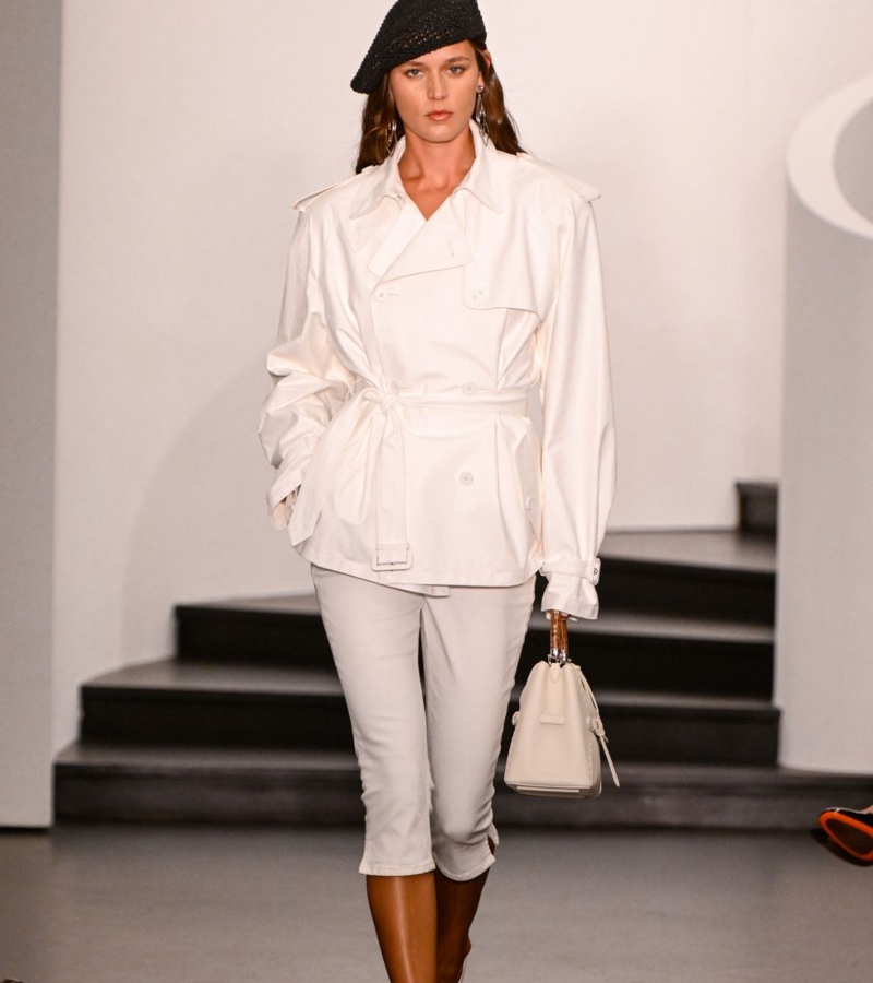 Styled with shirt dresses or tailored jackets, they redefined the art of subtle exaggeration. Neck ties appeared throughout, tucked neatly under vests or transformed into belts. / Photo Ralph Lauren