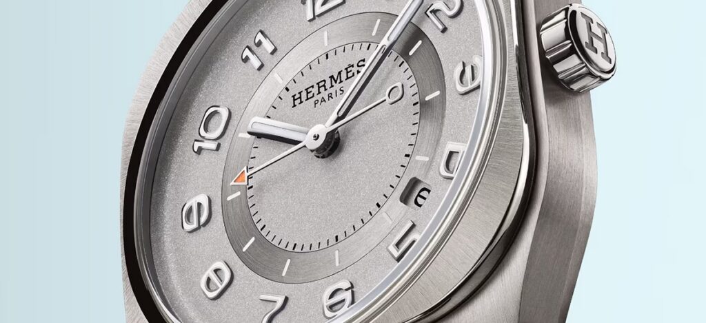 Hermès elevates its design icon H08 with two titanium editions. Each model introduces striking color contrasts and refined material combinations / Photo Hermès