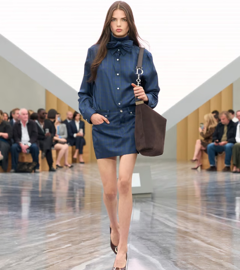 Visible seams, unfinished edges, and structural transformations emphasize the creative process. / Photo via Dior