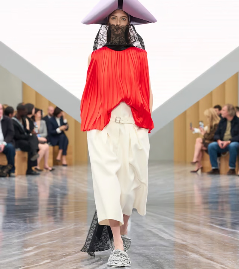 It acts as both memory and performance—allowing wearers to express identity through movement and transformation. / Photo via Dior