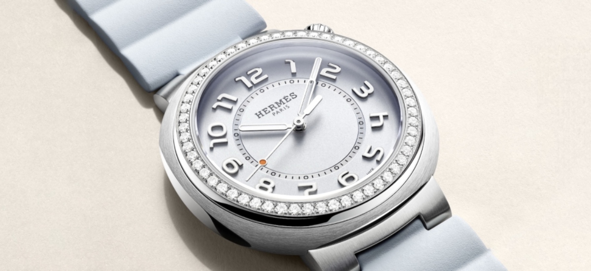 Its unique “cut” case design and crown positioned at 1:30 break traditional watchmaking symmetry, giving it a distinctive silhouette that feels both modern and timeless. / Photo via Hermès