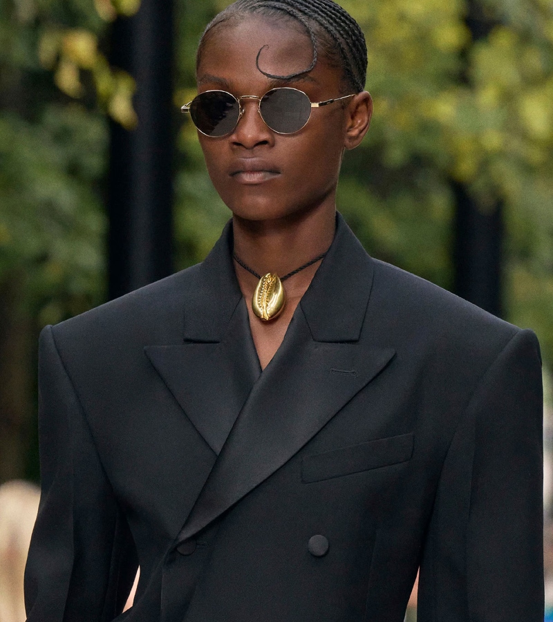 Lightweight fabrics such as silk chiffon, linen, and raffia take center stage, reflecting the effortless spirit of Celine. / Photo via Celine