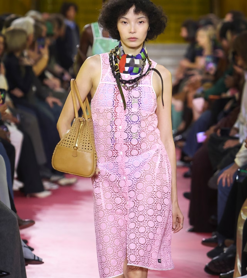 The runway was deliberately stripped down. No elaborate décor, no unnecessary spectacle—just models walking in quiet determination. / Photo Miu Miu