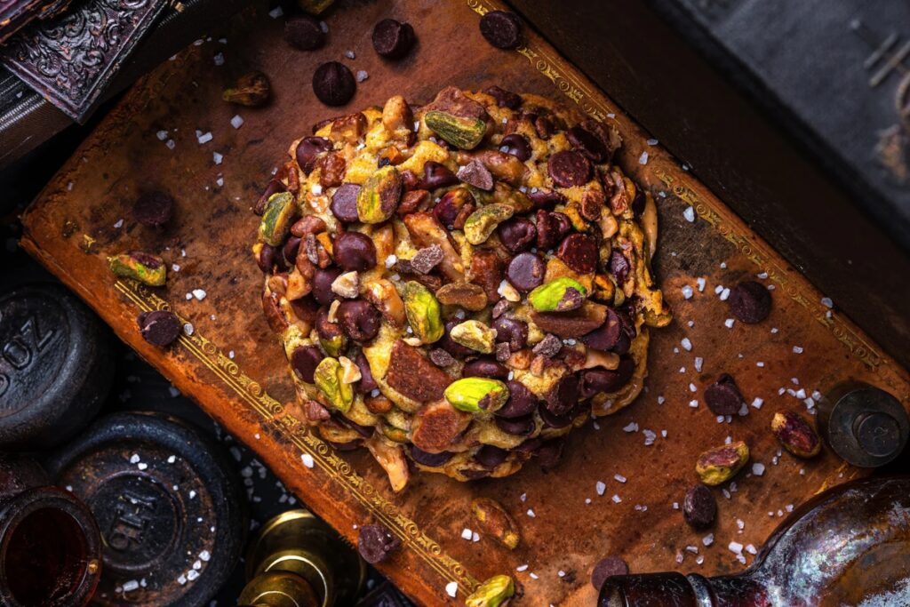 The now-iconic half-pound chocolate chip cookie took more than 15 years to perfect, embodying both his persistence and his passion for craft / Photo via Disney Springs