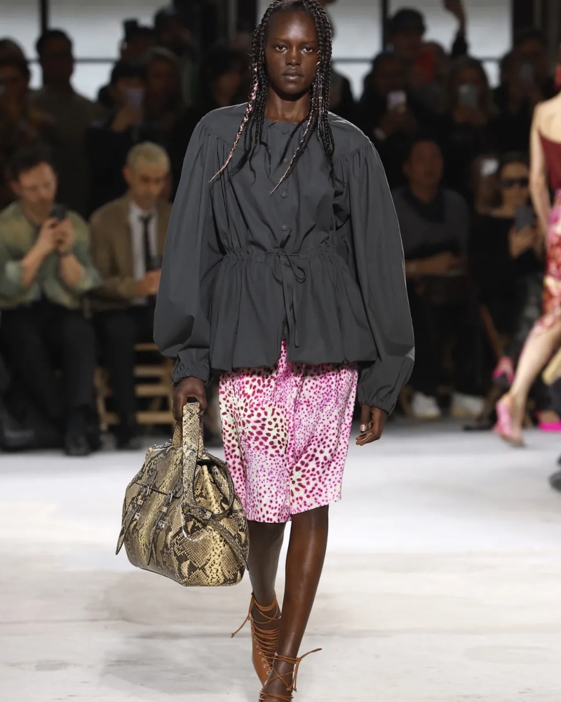 Lace-up ankle shoes are making a strong comeback, bridging the gap between Victorian romance and urban edge / Photo via Dries Van Noten