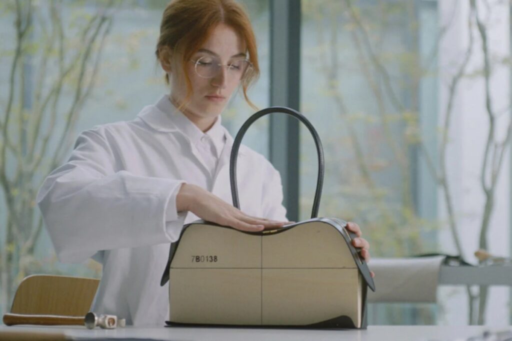 The Ryder Handbag is crafted using Stella McCartney’s innovative vegan alternatives to leather, shaped with wooden moulds to achieve its curved silhouette. / Photo via Stella McCartney