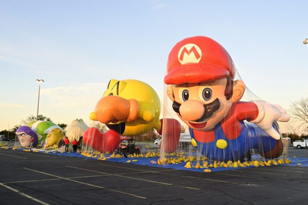 The Macy’s Thanksgiving Day Parade thrives on its balloon icons — enormous figures drifting past skyscrapers like flying dreams. / Photo Macys