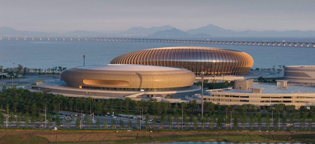 A 60,000-seat stadium, a 20,000-seat arena, a 4,000-seat aquatic centre, athlete housing, and training grounds. / Photo via CRLand