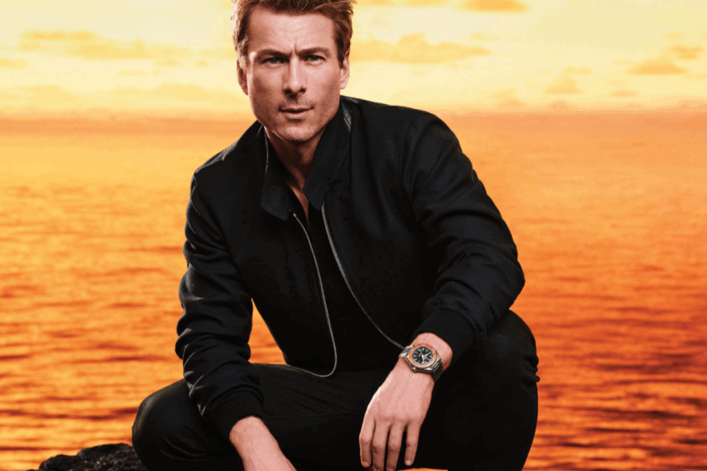 Campaigns featuring actors like Glen Powell and Aaron Taylor-Johnson highlight the watch’s dynamic appeal, bridging Hollywood glamour with professional utility. / Photo via Omega