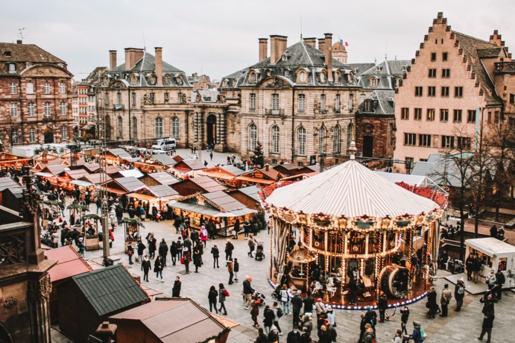 The legendary Christkindelsmärik has illuminated the city since 1570, turning its historic center into a glowing maze of wooden stalls. / Photo Islands